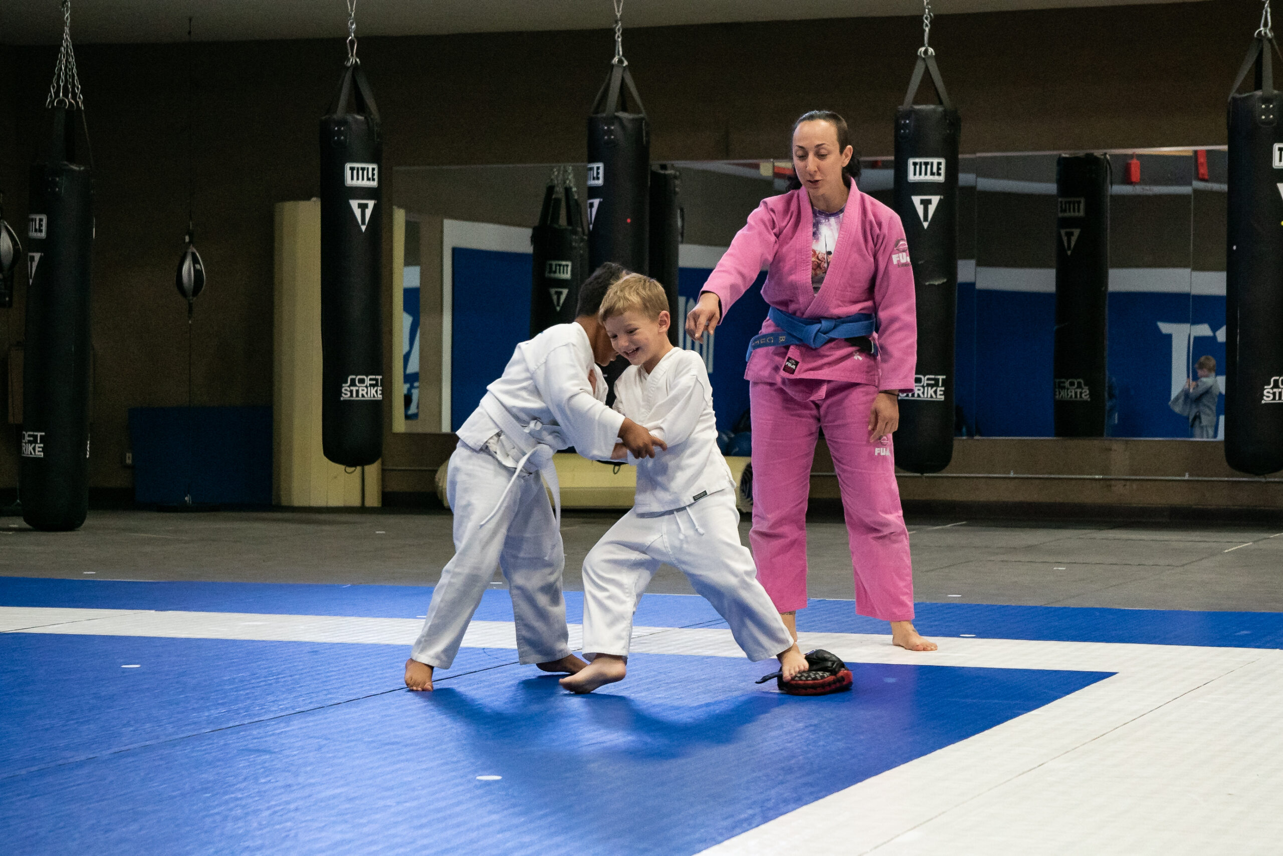 Older children doing jiu jitsu