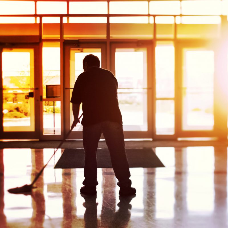 Janitor,Mopping,An,Office,Floor,,Shallow,Focus,,Tilt,Shift,Image